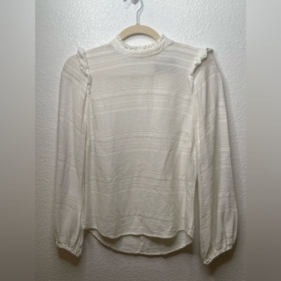 Reformation Cream Mock neck long sleeve blouse xxs
Purchased from The Real Real - Picture 3 of 14